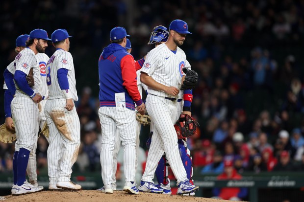 Cubs manager Craig Counsell (11) takes out Cubs pitcher Colin Rea (53) during the seventh inning against the Phillies at Wrigley Field April 20, 2026, in Chicago. (Armando L. Sanchez/Chicago Tribune)