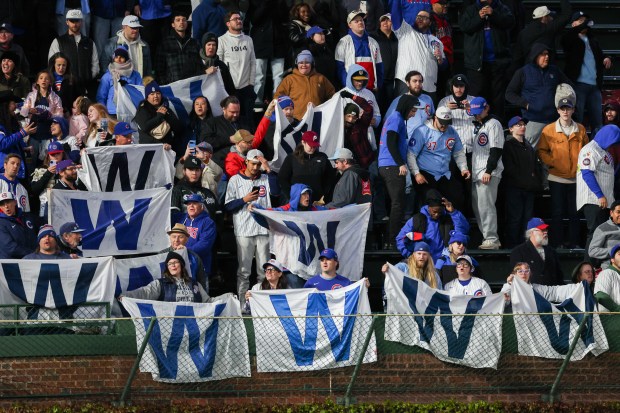 Fans celebrate after the Cubs defeated the Phillies, 5-1, at Wrigley Field April 20, 2026, in Chicago. (Armando L. Sanchez/Chicago Tribune)