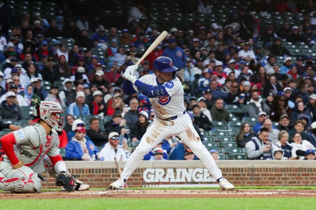 Cubs second baseman Nico Hoerner (2) stands at the plate during the first inning against the Phillies at Wrigley Field April 20, 2026, in Chicago. (Armando L. Sanchez/Chicago Tribune)
