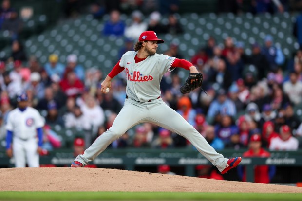 Phillies pitcher Aaron Nola (27) pitches during the first inning against the Cubs at Wrigley Field April 20, 2026, in Chicago. (Armando L. Sanchez/Chicago Tribune)