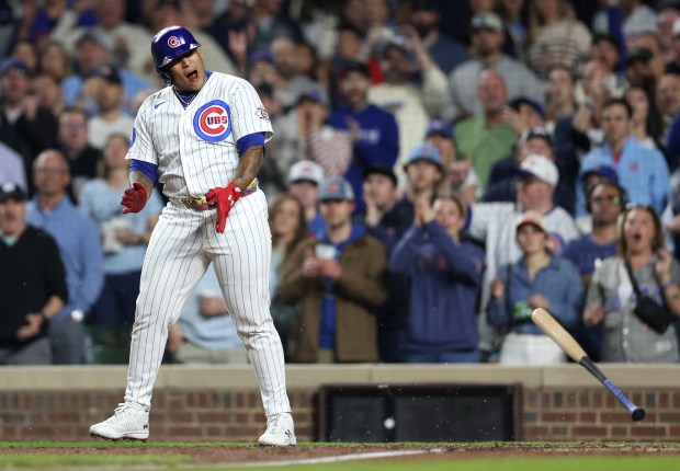 Chicago Cubs pinch hitter Moisés Ballesteros (25) celebrates after drawing a run-scoring walk in the fifth inning of a game against the Philadelphia Phillies at Wrigley Field in Chicago on April 21, 2026. (Chris Sweda/Chicago Tribune)