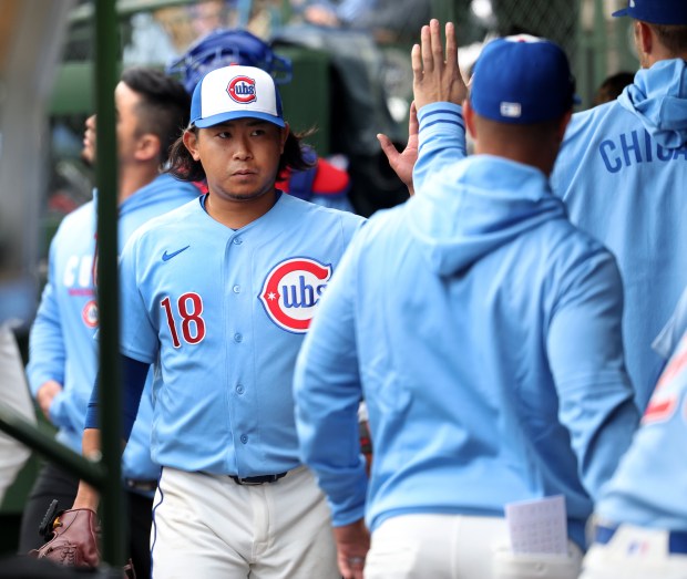 Chicago Cubs starting pitcher Shota Imanaga (18) walks through the dugout after finishing off the Pittsburgh Pirates in the sixth inning of a game at Wrigley Field in Chicago on April 10, 2026. (Chris Sweda/Chicago Tribune)