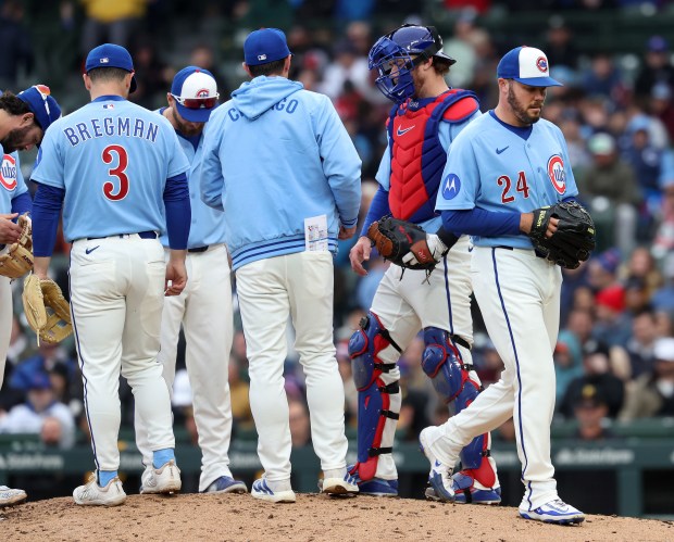 Chicago Cubs relief pitcher Caleb Thielbar (24) is pulled from the game in the seventh inning against the Pittsburgh Pirates at Wrigley Field in Chicago on April 10, 2026. (Chris Sweda/Chicago Tribune)