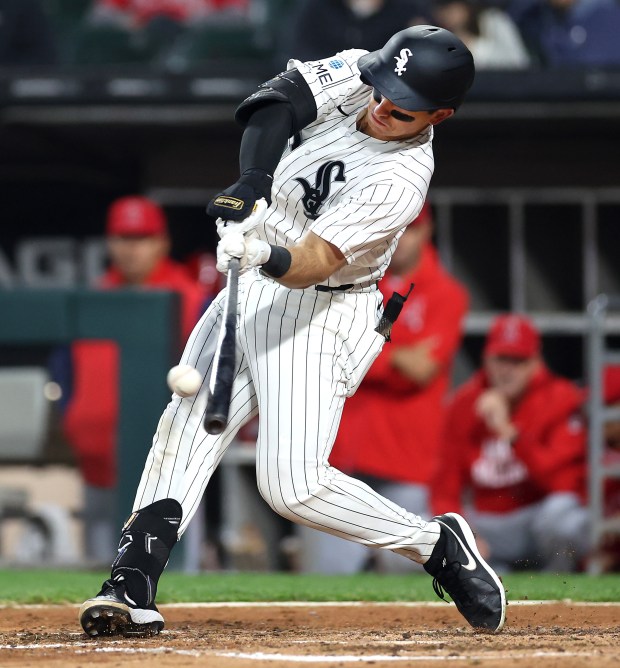 Chicago White Sox catcher Drew Romo hits a two-run home run in the fourth inning of a game against the Los Angeles Angels at Rate Field in Chicago on April 28, 2026. (Chris Sweda/Chicago Tribune)