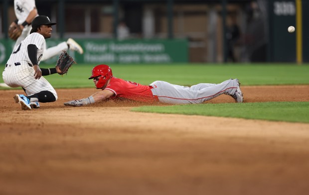Chicago White Sox short fielder Luisangel Acuña waits for the ball as Los Angeles Angels center fielder Mike Trout (27) steals second base in the fifth inning of a game at Rate Field in Chicago on April 28, 2026. (Chris Sweda/Chicago Tribune)
