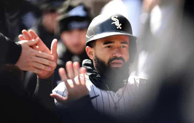 Chicago White Sox right fielder Derek Hill is congratulated by his teammates in the dugout after scoring on a double by Chase Meidroth in the third inning of a game against the Baltimore Orioles at Rate Field in Chicago on April 7, 2026. (Chris Sweda/Chicago Tribune)
