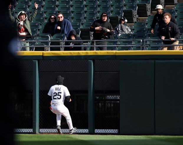 Chicago White Sox right fielder Derek Hill (25) watches as the ball sails over the fence for a 2-run home run for Baltimore Orioles designated hitter Gunnar Henderson in the eighth inning of a game at Rate Field in Chicago on April 7, 2026. (Chris Sweda/Chicago Tribune)