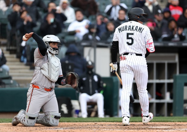 Chicago White Sox pinch hitter Munetaka Murakami (5) walks to the dugout after striking out in the ninth inning of a game against the Baltimore Orioles at Rate Field in Chicago on April 7, 2026. (Chris Sweda/Chicago Tribune)