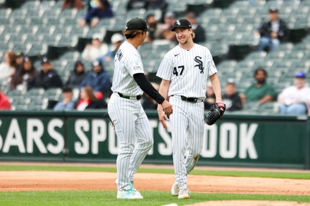 Chicago White Sox pitcher Erick Fedde (47) smiles at first baseman Munetaka Murakami (5) after they got the last out in the third inning against the Los Angeles Angels at Rate Field on April 29, 2026. (Eileen T. Meslar/Chicago Tribune)