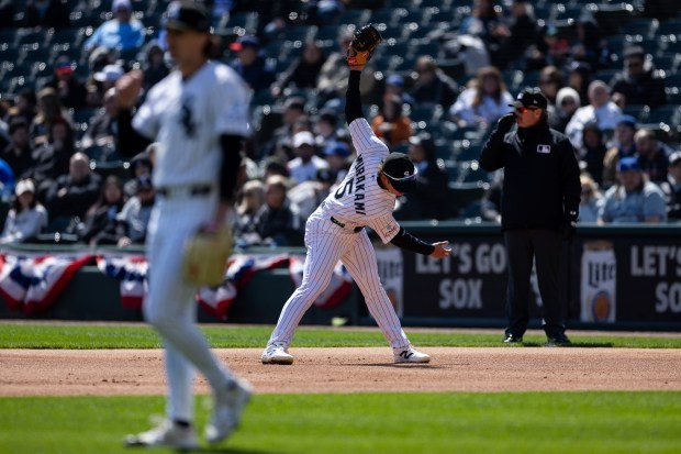Chicago White Sox first baseman Munetaka Murakami (5) stretches during during the first inning of a game against the Toronto Blue Jays at Rate Field on Sunday, April 5, 2026. (Josh Boland/Chicago Tribune)