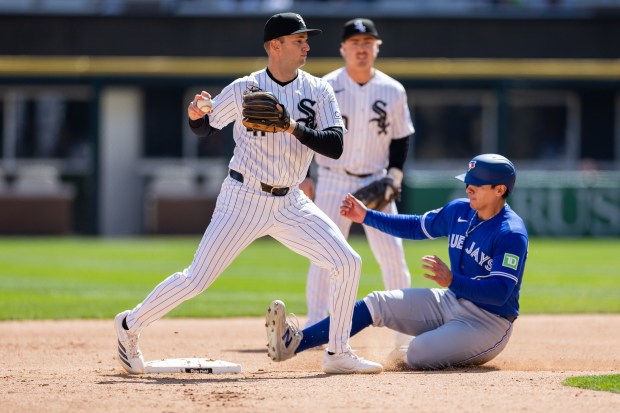 Chicago White Sox second baseman Tanner Murray (41) tags second base to get Toronto Blue Jays catcher Brandon Valenzuela (59) out during the second inning of a game against the Toronto Blue Jays at Rate Field on Sunday, April 5, 2026. (Josh Boland/Chicago Tribune)