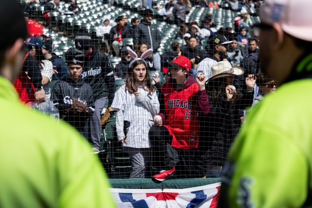 Chicago White Sox fans look to get autographs from players before a game against the Toronto Blue Jays at Rate Field on Sunday, April 5, 2026. (Josh Boland/Chicago Tribune)