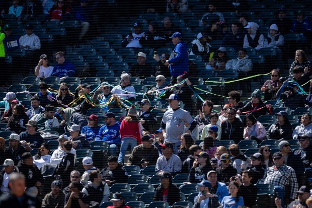 Fans are covered by colored ropes during a game against the Toronto Blue Jays at Rate Field on Sunday, April 5, 2026. (Josh Boland/Chicago Tribune)