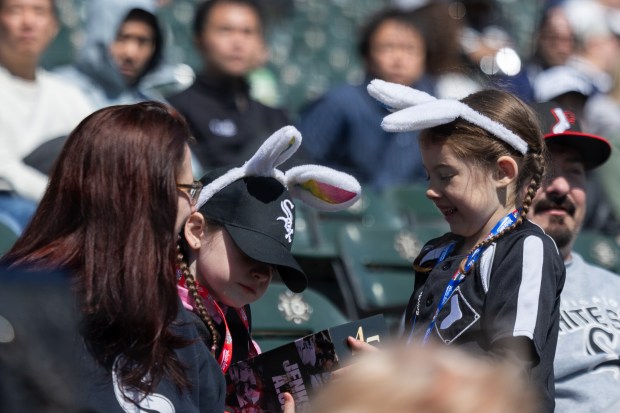 Chicago White Sox fans wear bunny ears in the stands as they react to a bobblehead during the second inning of a game against the Toronto Blue Jays at Rate Field on Sunday, April 5, 2026. (Josh Boland/Chicago Tribune)