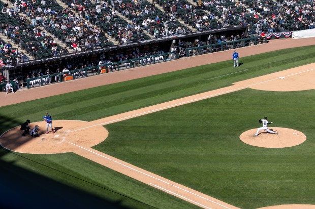 Chicago White Sox pitcher Jordan Leasure (49) throws a pitch towards Toronto Blue Jays first baseman Vladimir Guerrero Jr. (27) during the eighth inning of a game at Rate Field on Sunday, April 5, 2026. (Josh Boland/Chicago Tribune)