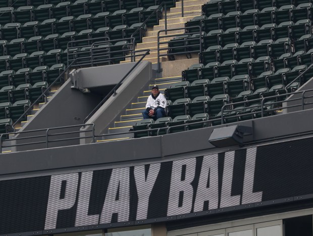 A White Sox fan sits alone in the right field upper deck for a White Sox-Orioles game at Rate Field on April 8, 2026, in Chicago. (John J. Kim/Chicago Tribune)