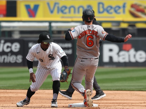 Orioles first baseman Ryan Mountcastle (6) beats the tag from White Sox shortstop Luisangel Acuña to steal second base in the second inning at Rate Field on April 8, 2026, in Chicago. (John J. Kim/Chicago Tribune)