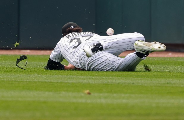 White Sox right fielder Dustin Harris chases down a ball hit for a single from Orioles left fielder Taylor Ward in the first inning at Rate Field on April 8, 2026, in Chicago. (John J. Kim/Chicago Tribune)