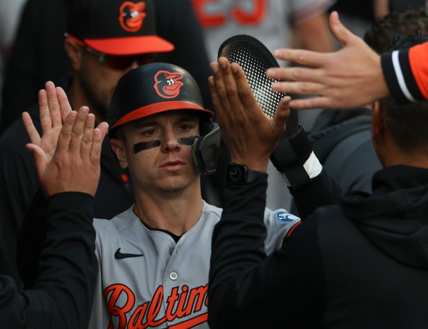 Orioles right fielder Tyler O'Neill celebrates after scoring on a sacrifice fly ball in the sixth inning against the White Sox at Rate Field on April 8, 2026, in Chicago. (John J. Kim/Chicago Tribune)