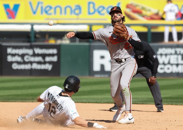 Orioles second baseman Blaze Alexander completes a double play on White Sox third baseman Colson Montgomery to end the seventh inning at Rate Field on April 8, 2026, in Chicago. (John J. Kim/Chicago Tribune)