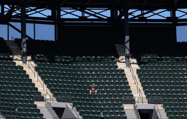 A lone fan sits in the right field upper deck in the ninth inning of a White Sox-Orioles game at Rate Field on April 8, 2026, in Chicago. (John J. Kim/Chicago Tribune)