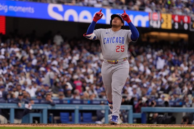 Cubs designated hitter Moisés Ballesteros gestures as he crosses the plate after hitting a solo home run during the fourth inning against the Dodgers on Saturday, April 25, 2026, in Los Angeles. (Mark J. Terrill/AP)