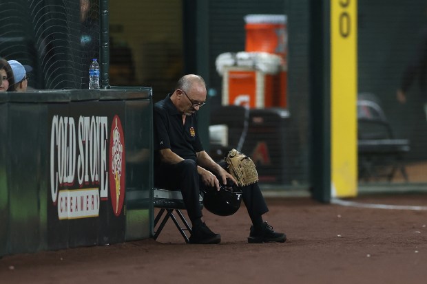 Howard Paley, the left-field ball person, reacts after attempting to field an inside-the-park home run hit by the White Sox's Sam Antonacci during the ninth inning against the Diamondbacks on April 21, 2026 in Phoenix. (Christian Petersen/Getty)