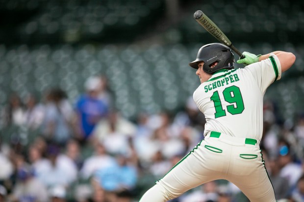 Oak Lawn's Aidan Schopper (19) at bat against Reavis during nonconference game at Wrigley Field in Chicago on Sunday, April 12, 2026. (Vincent D. Johnson / for the Daily Southtown)