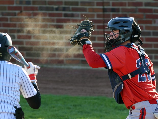 St. Rita's catcher Colin Quinn (27) during the game against Oak Forest in Chicago on Monday, April 6, 2026 (James C. Svehla / for Daily Southtown)
