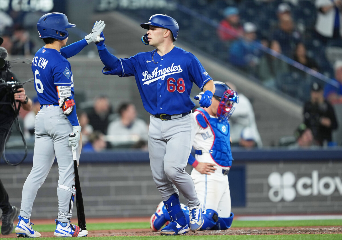 Apr 6, 2026; Toronto, Ontario, CAN; Los Angeles Dodgers catcher Dalton Rushing (68) hits a home run and celebrates with shortstop Hyeseong Kim (6) against the Toronto Blue Jays during the eighth inning at Rogers Centre. Mandatory Credit: Nick Turchiaro-Imagn Images
