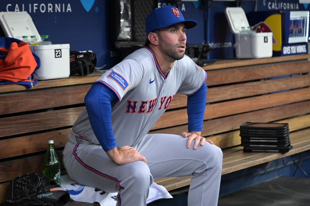 David Peteson sits in the dugout before the Mets' loss to the Dodgers on April 13, 2026 in Los Angeles.