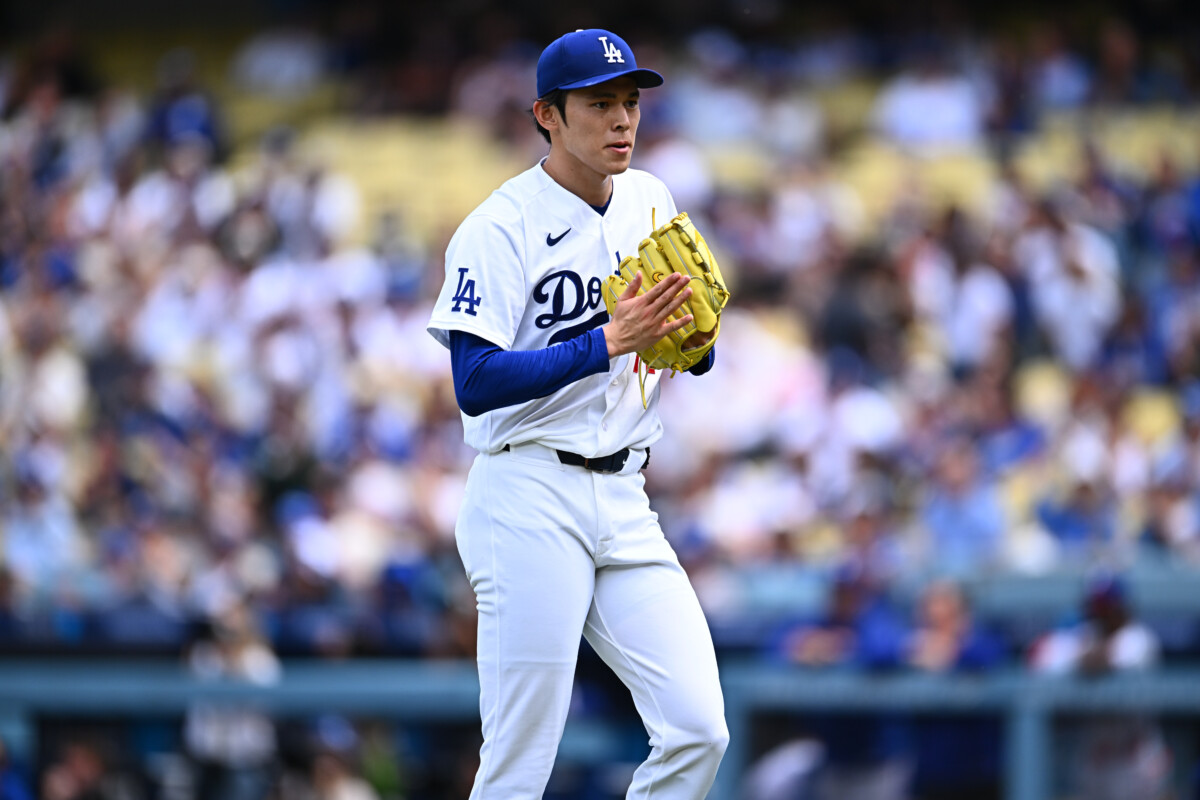Apr 12, 2026; Los Angeles, California, USA; Los Angeles Dodgers pitcher Roki Sasaki (11) reacts after his last pitch thrown during the second inning against the Texas Rangers at Dodger Stadium. Mandatory Credit: Jonathan Hui-Imagn Images