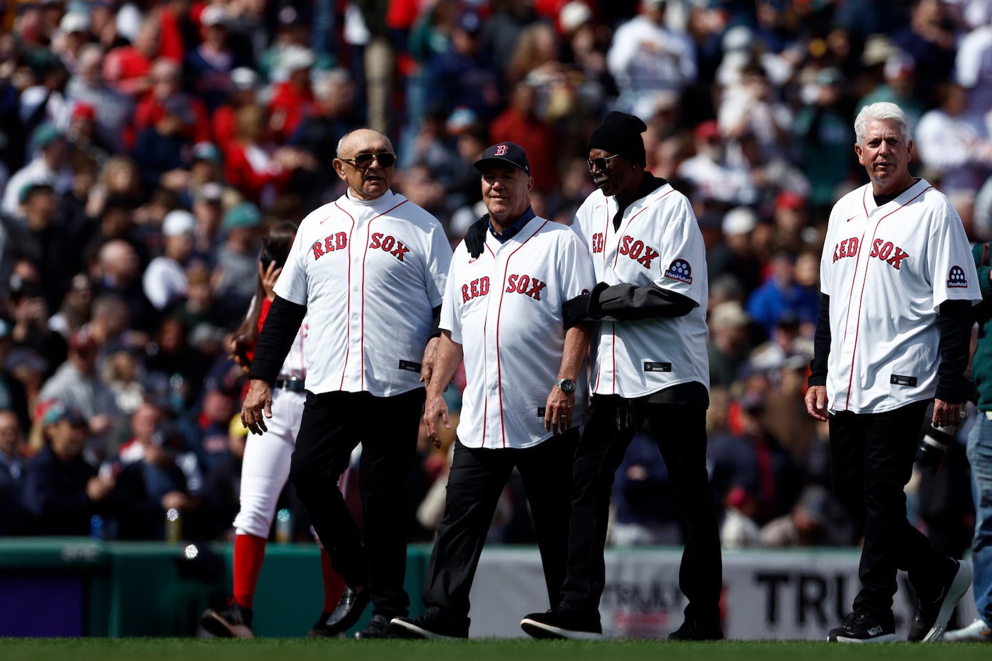 Former Red Sox outfielder Tony Armas (far left) walks out with his teammates from the 1986 team as they’re honored during the Opening Day ceremony.