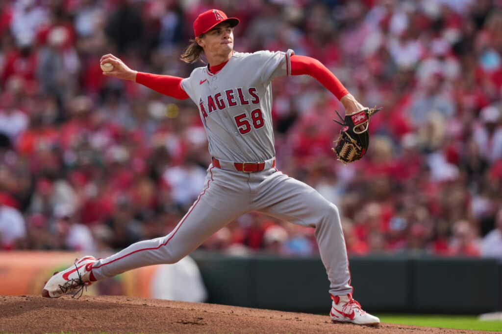 Apr 11, 2026; Cincinnati, Ohio, USA; Los Angeles Angels pitcher George Klassen (58) throws against the Cincinnati Reds in the first inning at Great American Ball Park. Mandatory Credit: Aaron Doster-Imagn Images