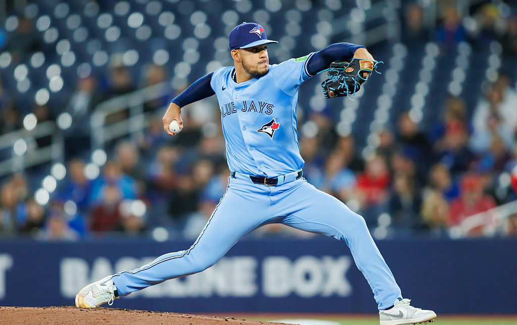 TORONTO, CANADA - APRIL 1: José Berríos #17 of the Toronto Blue Jays pitches in the first inning against the Washington Nationals at Rogers Centre on April 1, 2025 in Toronto, Ontario, Canada. (Photo by Cole Burston/Getty Images)