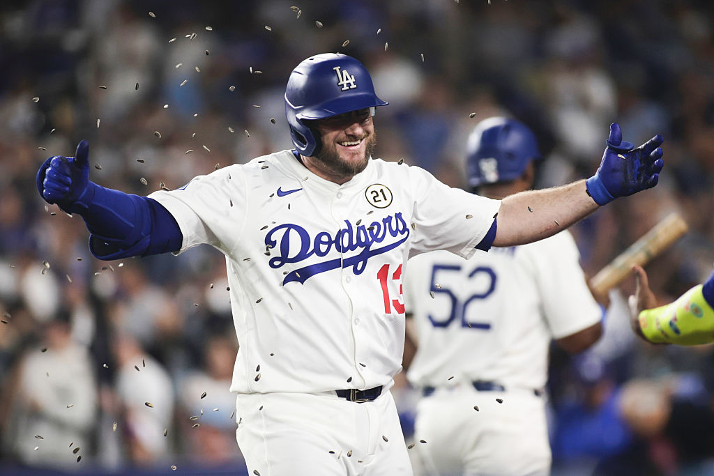 LOS ANGELES, CA - SEPTEMBER 15: Max Muncy #13 of the Los Angeles Dodgers celebrates with Teoscar Hernández #37 after hitting a solo home run in the fifth inning during the game between the Philadelphia Phillies and the Los Angeles Dodgers at Dodger Stadium on Monday, September 15, 2025 in Los Angeles, California. (Photo by Emma Sharon/MLB Photos via Getty Images)