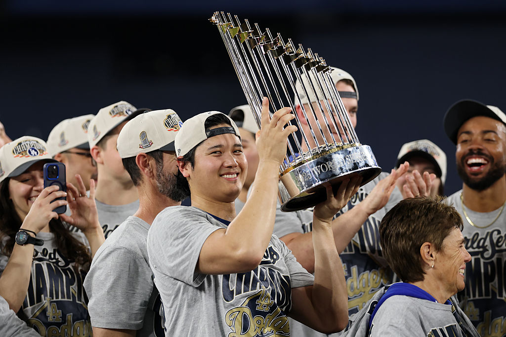 TORONTO, ONTARIO - NOVEMBER 02: Shohei Ohtani #17 of the Los Angeles Dodgers holds the Commisioner's Trophy after defeating the Toronto Blue Jays 5-4 in game seven of the 2025 World Series at Rogers Center on November 02, 2025 in Toronto, Ontario. (Photo by Emilee Chinn/Getty Images)