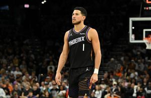 PHOENIX, ARIZONA - FEBRUARY 10: Devin Booker #1 of the Phoenix Suns looks up court during a game against the Dallas Mavericks at Mortgage Matchup Center on February 10, 2026 in Phoenix, Arizona. NOTE TO USER: User expressly acknowledges and agrees that, by downloading and or using this photograph, User is consenting to the terms and conditions of the Getty Images License Agreement.  (Photo by Norm Hall/Getty Images)