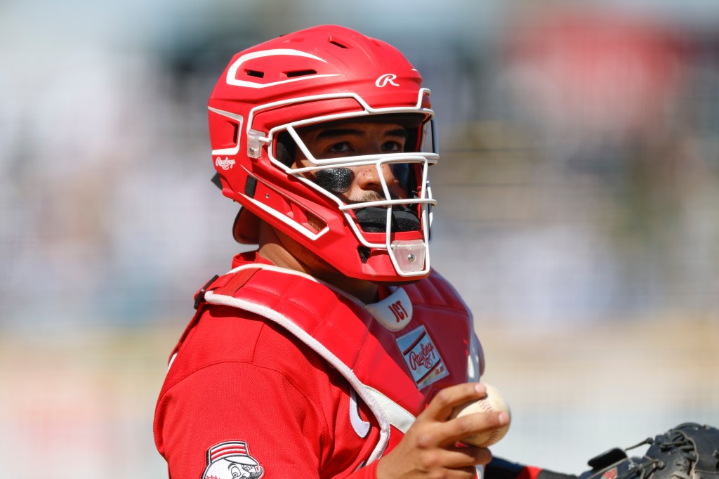 Jose Trevino #35 of the Cincinnati Reds holds the ball during a Spring Training game against the Los Angeles Dodgers at Goodyear Ballpark on March 5, 2026 in Goodyear, Arizona. 