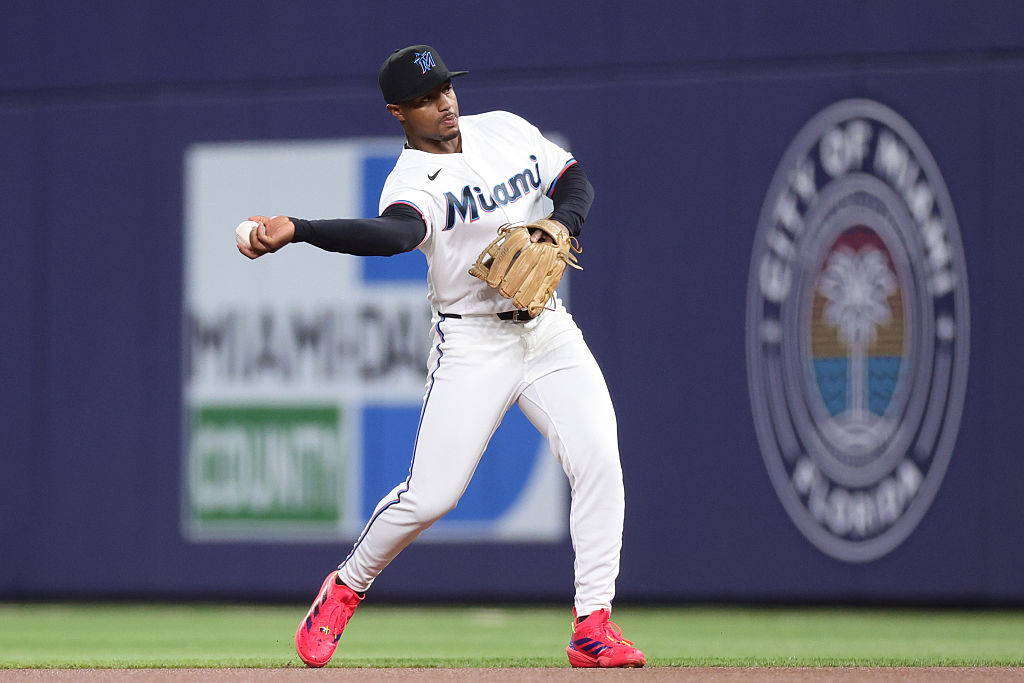 MIAMI, FLORIDA - MARCH 30: Xavier Edwards #9 of the Miami Marlins throws the ball to first base against the Chicago White Sox in the first inning of the game at loanDepot park on March 30, 2026 in Miami, Florida. (Photo by Megan Briggs/Getty Images)