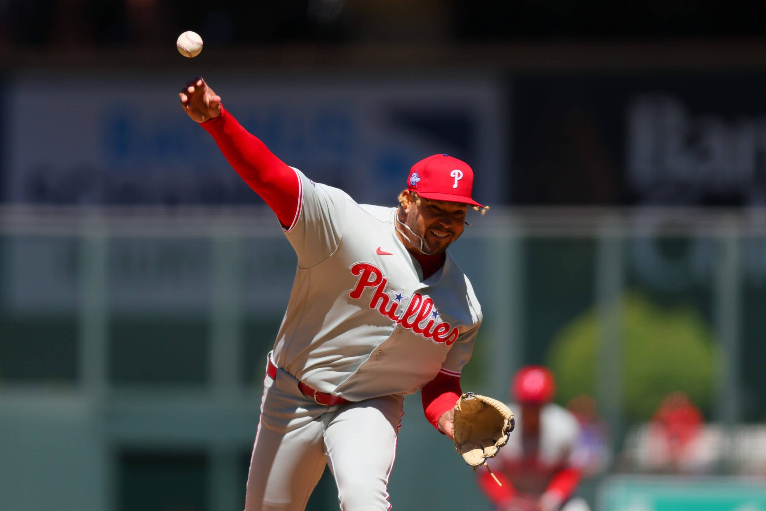 Starting pitcher Taijuan Walker of the Philadelphia Phillies delivers a pitch against the Colorado Rockies.