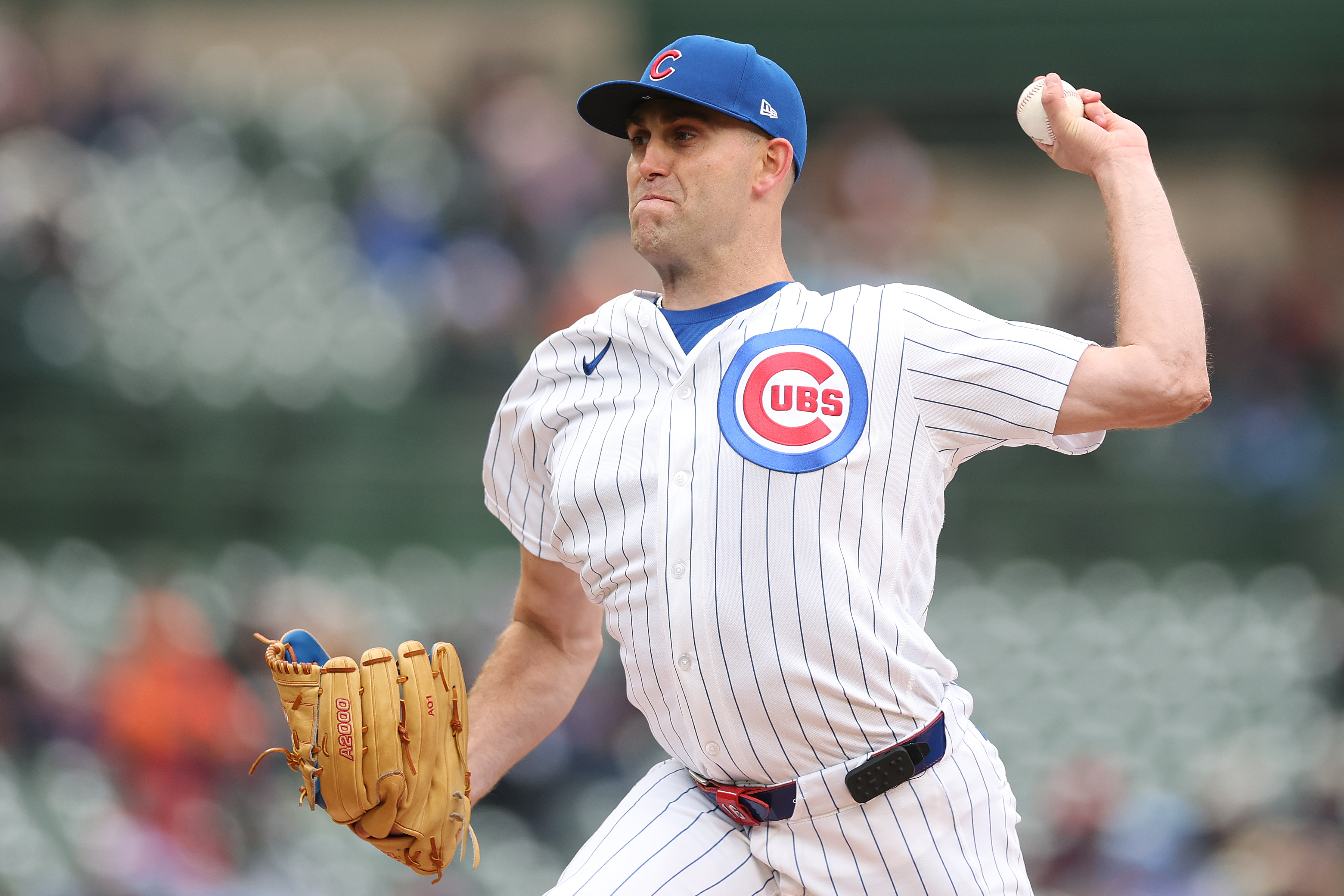 Chicago Cubs starting pitcher Matthew Boyd throws to the plate...