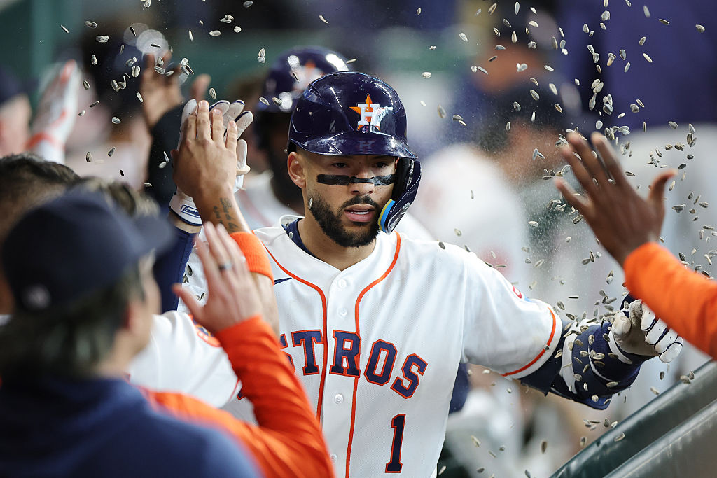 HOUSTON, TEXAS - APRIL 01: Carlos Correa #1 of the Houston Astros celebrates in the dugout after hitting a three run home run during the fifth inning against the Boston Red Sox at Daikin Park on April 01, 2026 in Houston, Texas. (Photo by Alex Slitz/Getty Images)