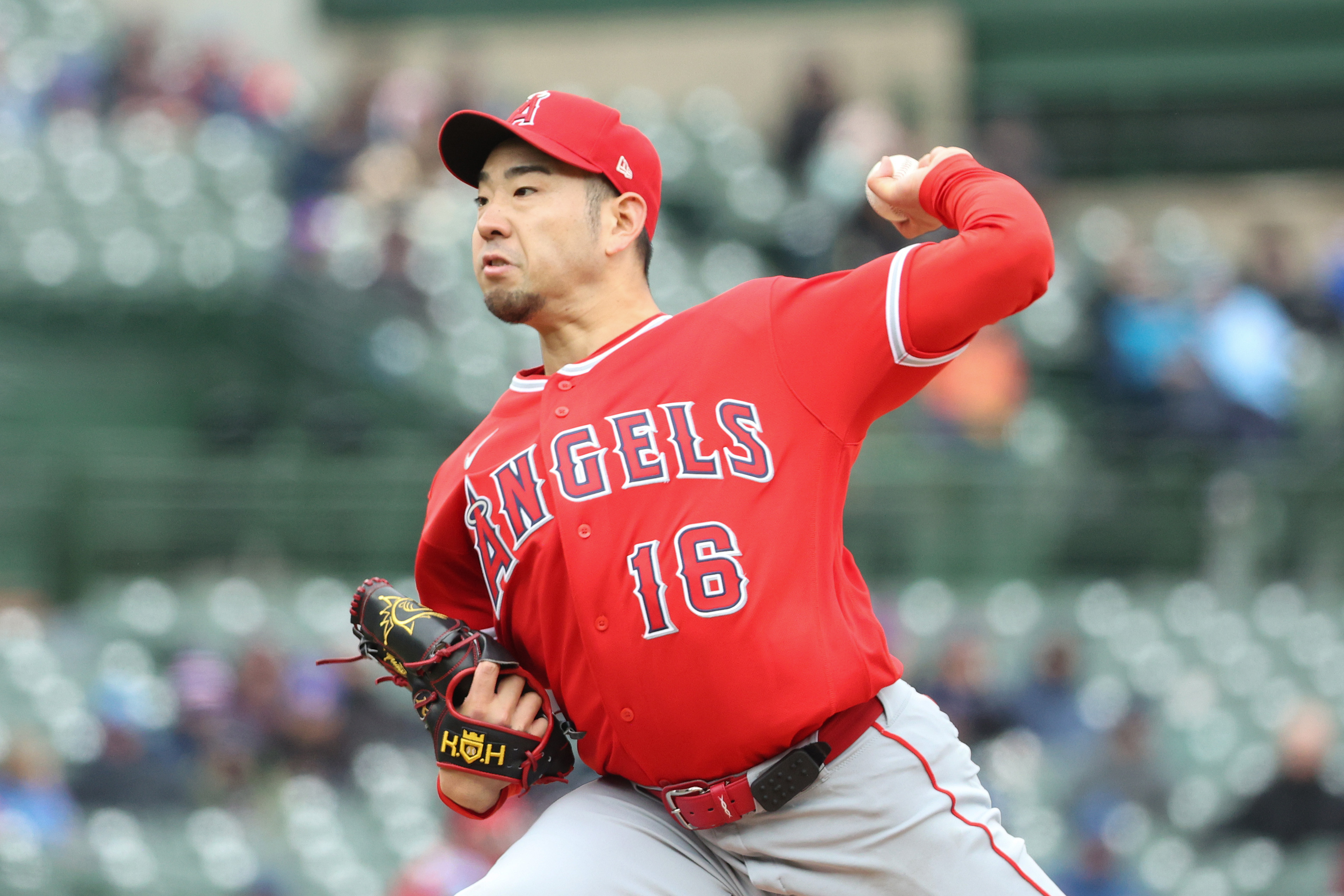 Angels starting pitcher Yusei Kikuchi throws to the plate during...