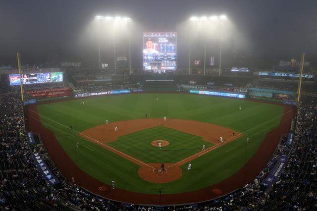 A general view as fog rolls in during the game between the Minnesota Twins and the Kansas City Royals at Kauffman Stadium on April 1, 2026 in Kansas City.