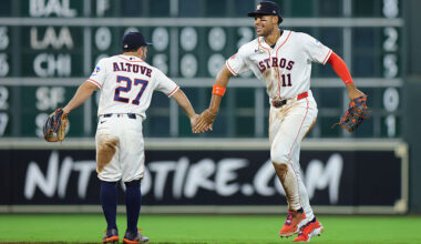 HOUSTON, TEXAS - APRIL 01: Jose Altuve #27 and Cam Smith #11 of the Houston Astros react after a win against the Boston Red Sox at Daikin Park on April 01, 2026 in Houston, Texas. (Photo by Alex Slitz/Getty Images)