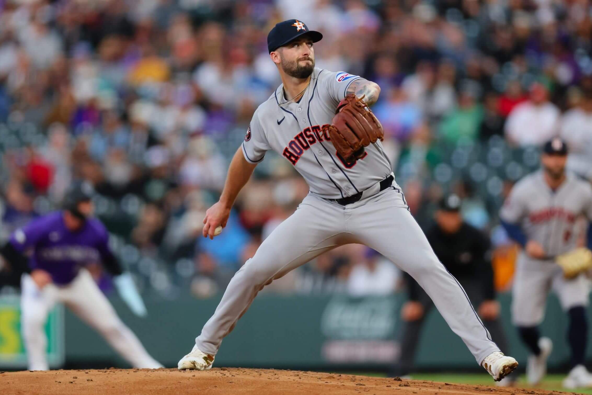 Houston's Cody Bolton gets set to throw a pitch.