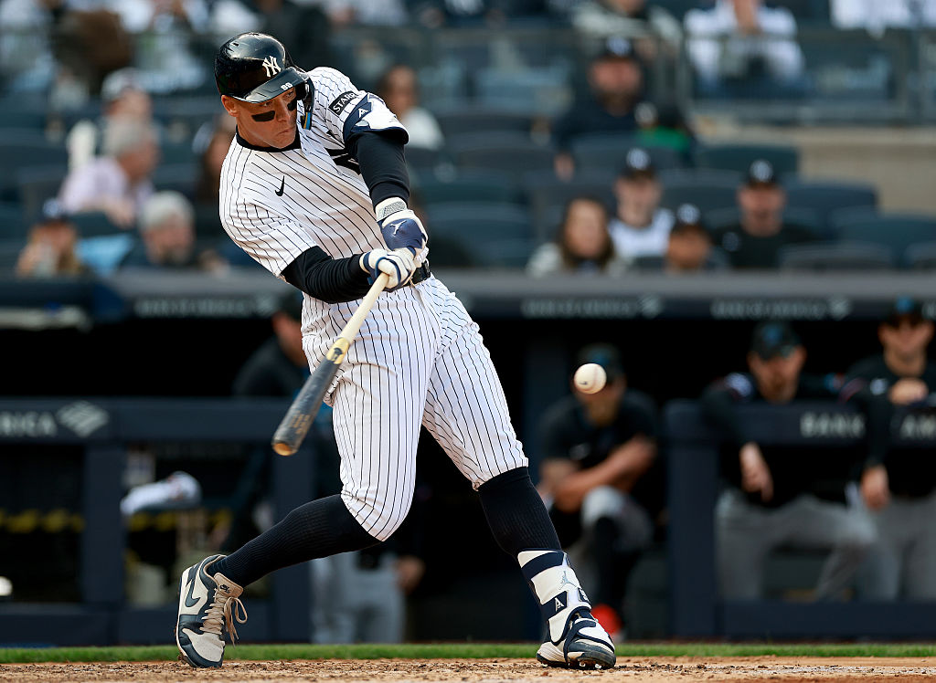 NEW YORK, NEW YORK - APRIL 03: Aaron Judge #99 of the New York Yankees hits a single in the eighth inning during the home opener at Yankee Stadium on April 03, 2026 in the Bronx borough of New York City. The New York Yankees defeated the Miami Marlins 8-2. (Photo by Elsa/Getty Images)