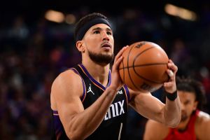 PHOENIX, AZ - APRIL 14: Devin Booker #1 of the Phoenix Suns shoots a free throw during the game against the Portland Trail Blazers during the 2026 SoFi Play-In Tournament on April 14, 2026 at PHX Arena in Phoenix, Arizona. NOTE TO USER: User expressly acknowledges and agrees that, by downloading and or using this photograph, user is consenting to the terms and conditions of the Getty Images License Agreement. Mandatory Copyright Notice: Copyright 2026 NBAE (Photo by Kate Frese/NBAE via Getty Images)