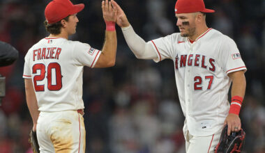 ANAHEIM, CALIFORNIA - APRIL 17: Adam Frazier #20 of the Los Angeles Angels congratulates Mike Trout #27 after the final out of the ninth inning against the San Diego Padres at Angel Stadium of Anaheim on April 17, 2026 in Anaheim, California.